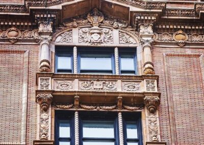 Glass Fiber Reinforced Concrete ornate paneling colored as terracotta for manhattan facade